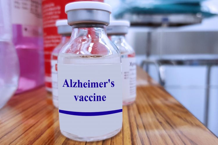glass vial labelled 'Alzheimer's Vaccine'