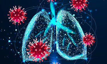 Outline of lungs and SARS-CoV-2 particles