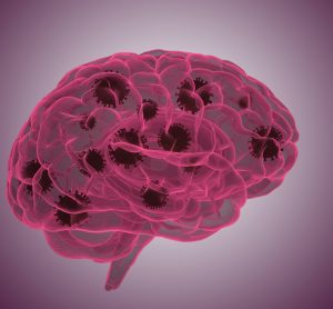 Outline of a brain in purple with dark brown coronavirus particles within it