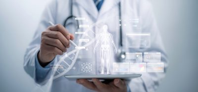 A doctor using a digital tablet with floating medical data visualizations, including a human skeleton model, DNA strand, AI icon, and health analytics charts, symbolizing data-driven and AI-supported medical research.