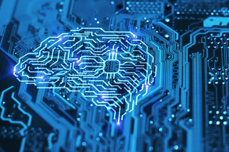 Brain lit up in blue on a circuit board - idea of machine learning/artificial intelligence