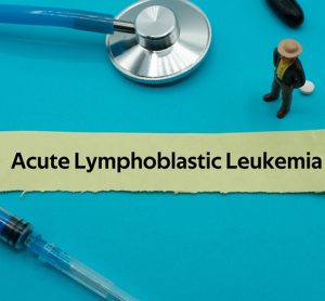 Acute Lymphoblastic Leukemia.The word is written on a slip of colored paper.