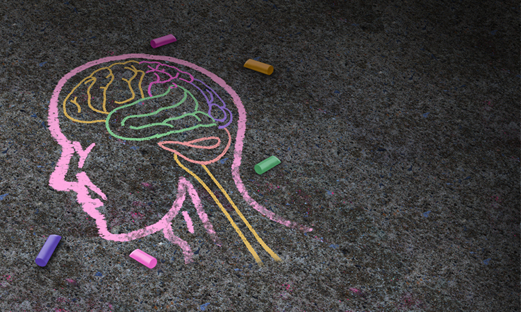 Concept of autism and autistic development disorder as a symbol of a communication and social behavior psychology as a chalk drawing on asphalt in a 3D illustration style.