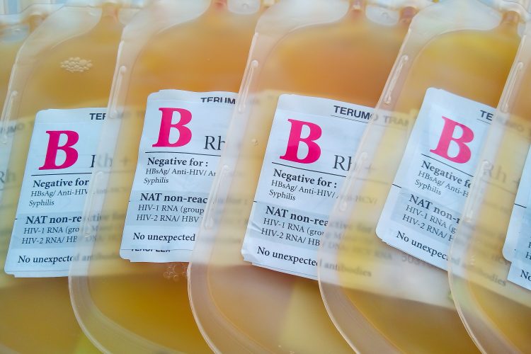 bags of yellow-coloured blood plasma labelled for use as therapeutics
