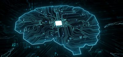 Brain representing artificial intelligence with printed circuit board