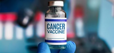 Experimental cancer vaccine vial for immunization against Cancer disease. Doctor with vial of the Cancer vaaccine