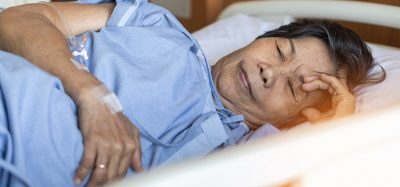 patient sleeping in a hospital bed