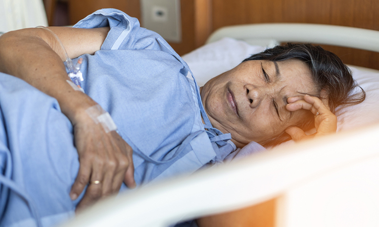 patient sleeping in a hospital bed