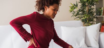 Person suffering chronic back pain