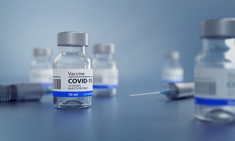 3D Illustration of a Generic Covid19 Vaccine and a Syringe, Blue Background