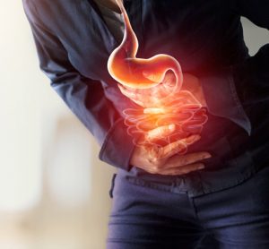 Image showing person in pain from gastrointestinal cancer