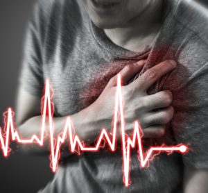 man having a heart attack, with cartoon heart rhythm overlaid
