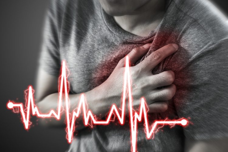 man having a heart attack, with cartoon heart rhythm overlaid