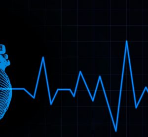 blue heart sketch overlaid with heartbeat