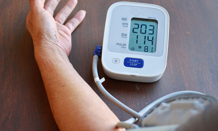 Image showing person check blood pressure and heart rate at home with digital pressure