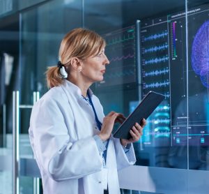woman looking at a brain scan
