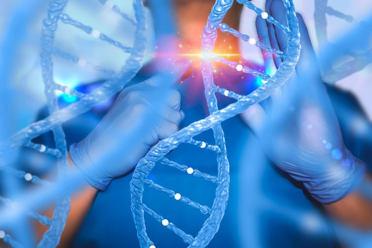 Doctor standing behind DNA molecules, representing gene therapy