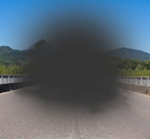 View of road with blocked vision in middle