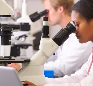 Female and male scientists in lab
