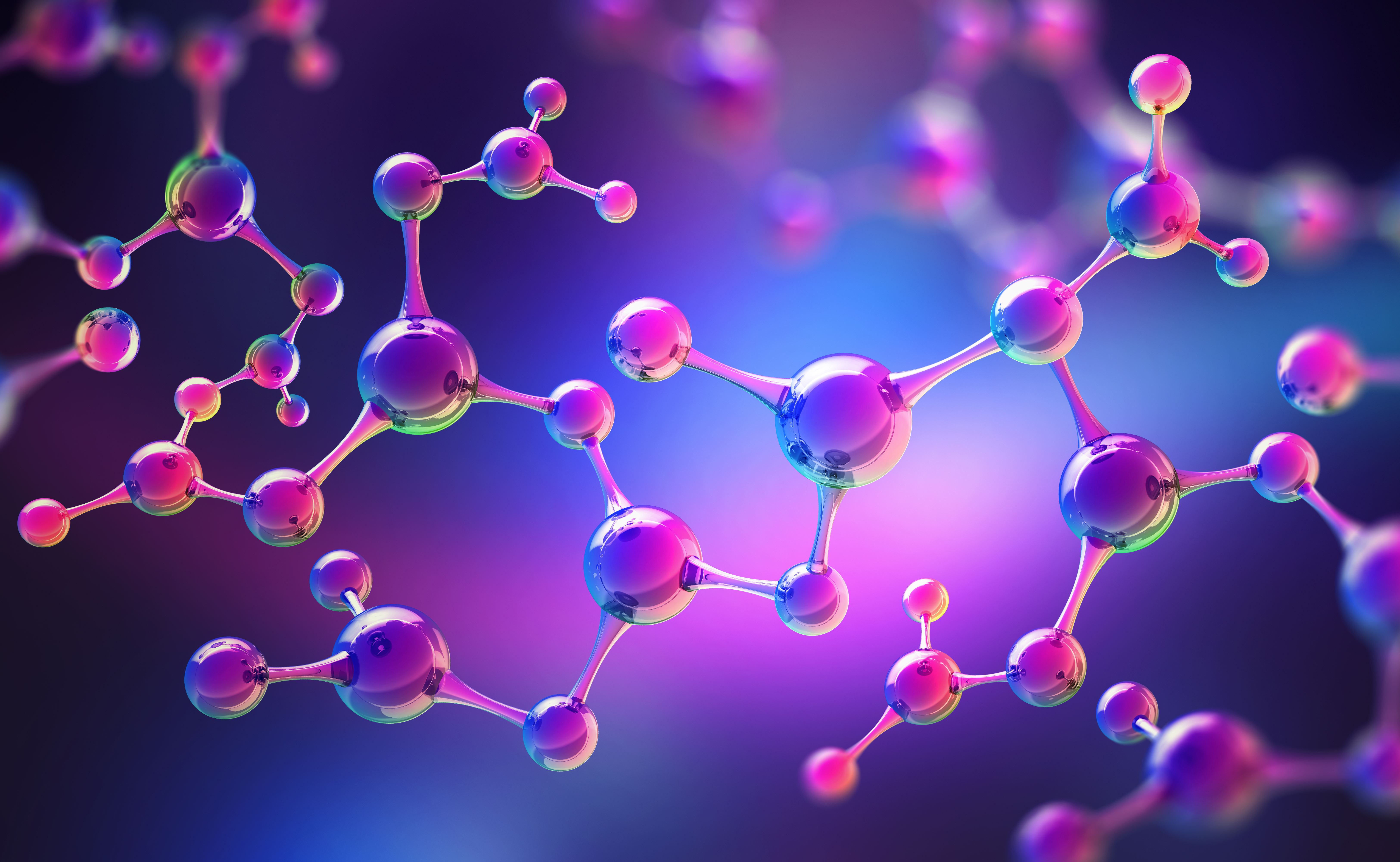 Abstract 3D illustration of colorful molecular structures connected by bonds, symbolizing protein–protein interactions and drug discovery research.