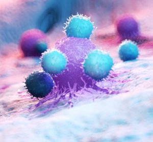 Immune cells attacking cancer tumour