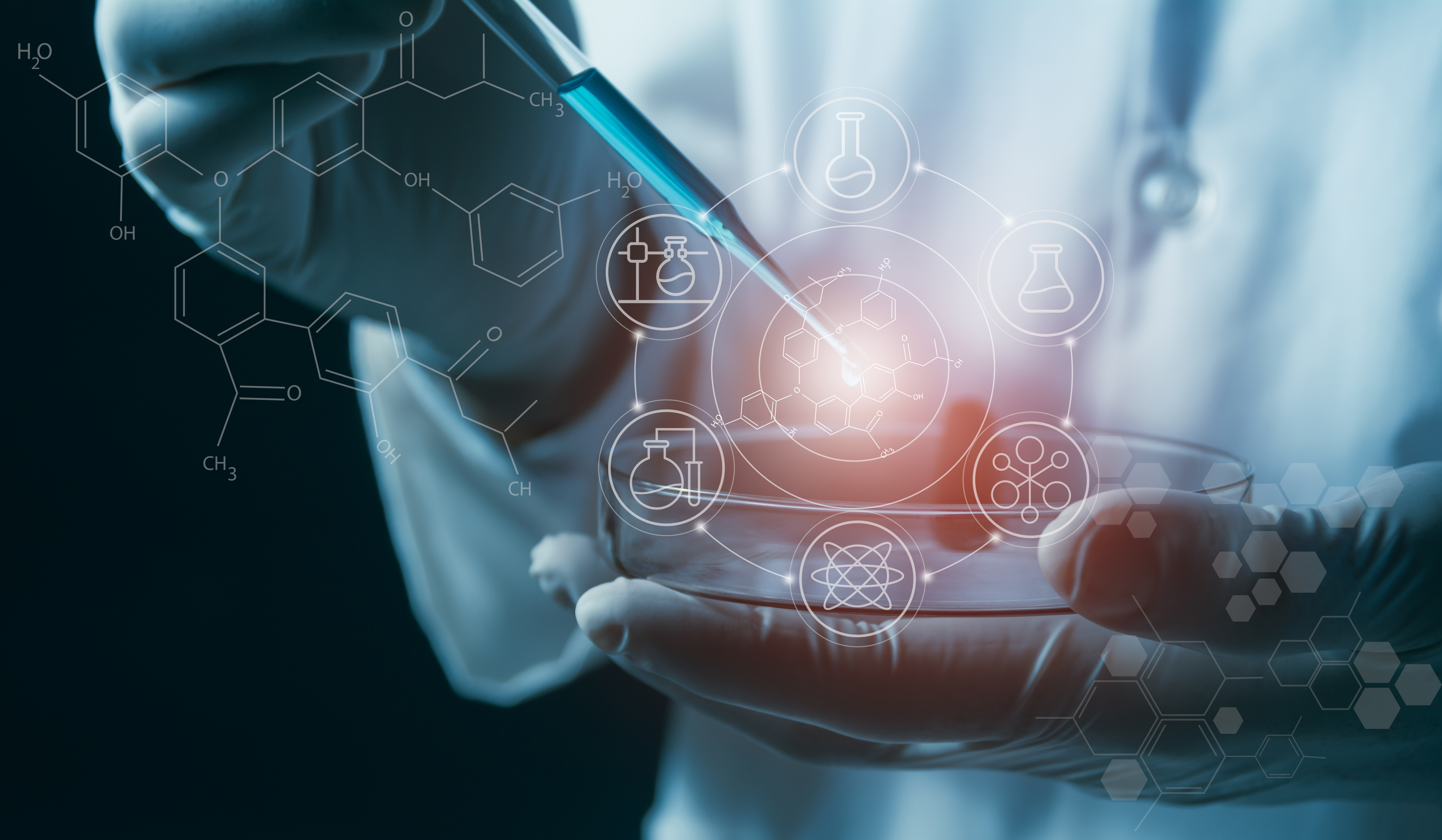 A scientist uses a pipette over a petri dish with digital molecular and chemical structure graphics, representing innovation and predictive modelling in drug discovery.