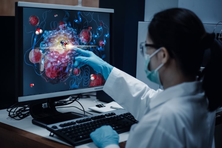 Scientist with 3D Protein Model on Screen
