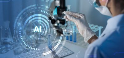 Scientist in a laboratory holding a glass flask while digital AI graphics overlay the scene, representing artificial intelligence and automation in lab research.