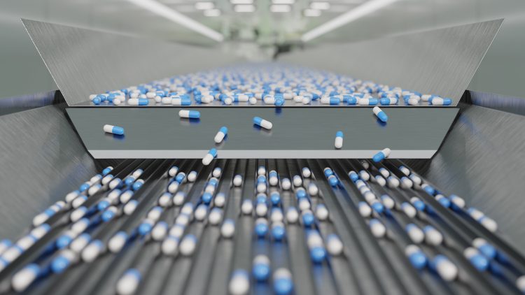An image of the production line for mass-produced blue capsules.