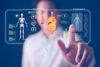 Doctor interacting with a futuristic digital medical interface showing human skeleton, organs, DNA strands, and health data visualisations, symbolising AI and precision medicine.