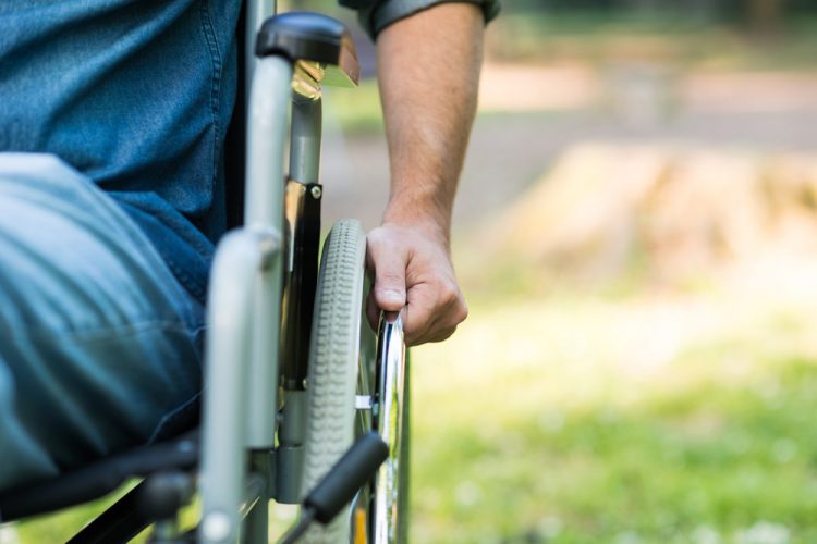 Male MS patient in wheelchair