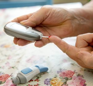 Diabetic woman checking insulin levels