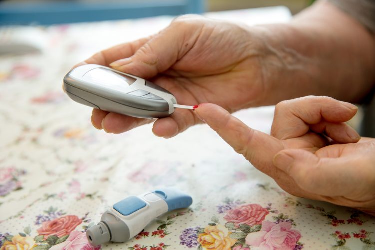 Diabetic woman checking insulin levels