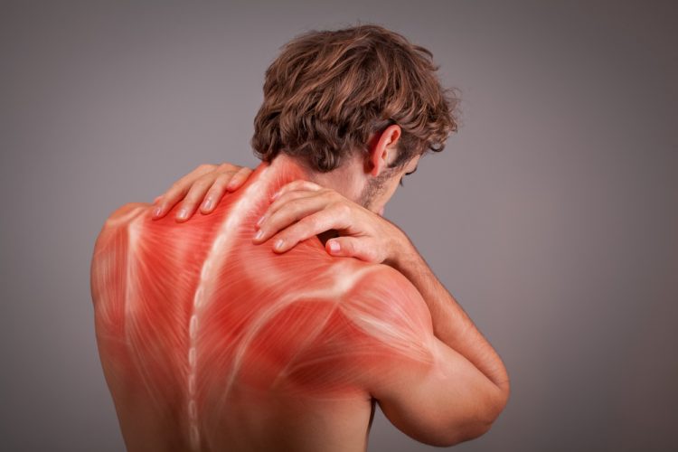 Man with back muscle pain