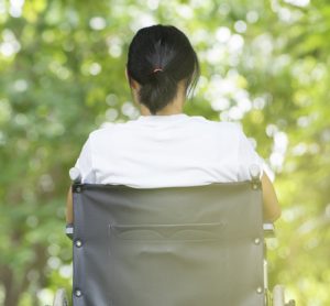 Back of woman in a wheelchair