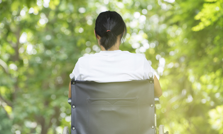 Back of woman in a wheelchair